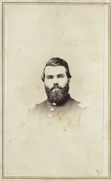 Vignetted carte-de-visite portrait of 1st Lieutenant George F. Dinsmore, Company K, 30th Wisconsin Infantry.