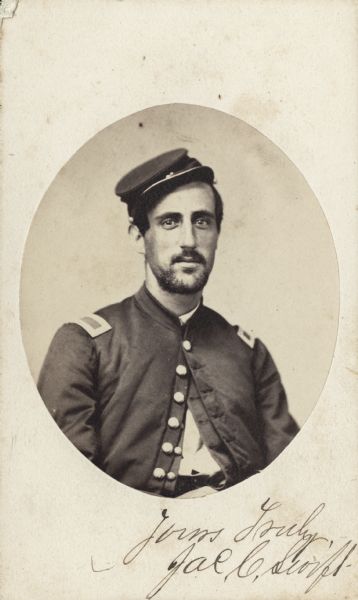 Waist-up carte-de-visite portrait of Lieutenant James C. Swift, Company B, 1st Alabama Cavalry, in uniform and wearing a hat. Swift mustered into service as a 2nd Lieutenant and mustered out as a 1st Lieutenant.