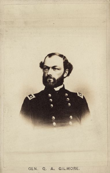 Vignetted carte-de-visite portrait of Major General Quincy A. Gilmore, who conducted the siege at Fort Pulaski, and from June 1863 to May 1864 he commanded the Department of the South.