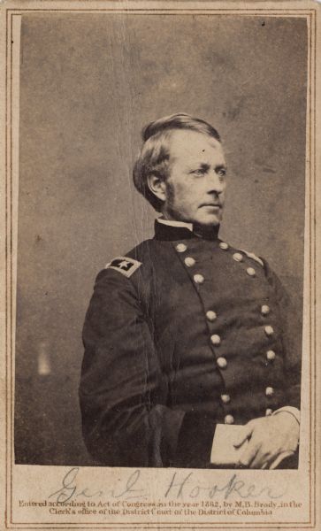 Waist-up carte-de-visite portrait of Major General Joseph Hooker. General Hooker received a commission of Brigadier General from President Lincoln following the Union defeat at the First Battle of Bull Run. In May 1862, after the Battle of Williamsburg, he was promoted to Major General and went on to command forces at the battles of Antietam, Fredericksburg, Chancellorsville, and through the Atlanta Campaign.
