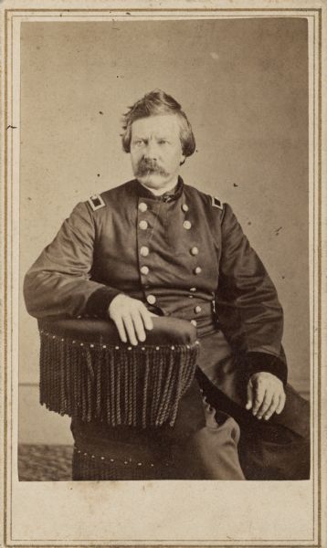 Seated carte-de-visite portrait of Major General Albion Parris Howe, commander of the 2nd Division, 6th Corps, Army of the Potomac.