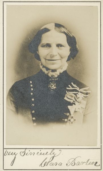 Quarter-length carte-de-visite portrait of Clara Harlowe Barton. On April 20, 1862, after the First Battle of Bull Run (First Manassas), she established an agency to obtain and distribute supplies to wounded soldiers. In July 1862 she received permission to travel behind the lines to treat wounded soldiers, serving this function during battles of Antietam, Fredericksburg, Second Bull Run (Second Manassas) and the Siege of Petersburg. After the war she became associated with the Suffrage Movement and formed the American Red Cross in 1881.