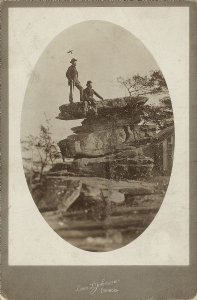Captain John Henry Otto, (marked with X), along with another man from the 21st Wisconsin Infantry, posing on the top of Lookout Mountain, Tennessee. John Henry Otto was from Appleton, Wisconsin and enlisted in Company D, 21st Wisconsin Infantry, as a sergeant on August 12, 1862. On April 27, 1865 he was promoted to the rank of captain. John Otto was mustered out of service on June 8, 1865.