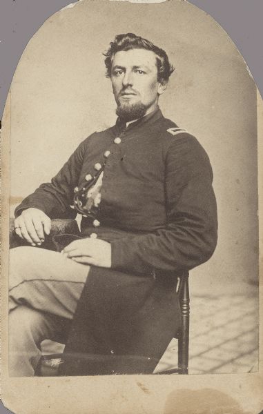 Seated carte-de-visite portrait of an unknown Union officer.