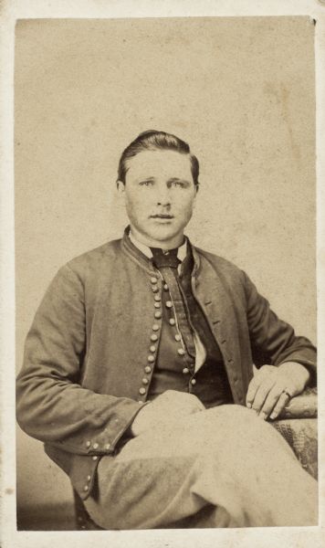 Seated carte-de-visite portrait of an unknown Union soldier.
