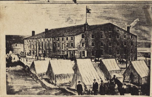 A heavily retouched photographic view of Libby Prison. This view shows tents and three tenement (loft style) buildings.