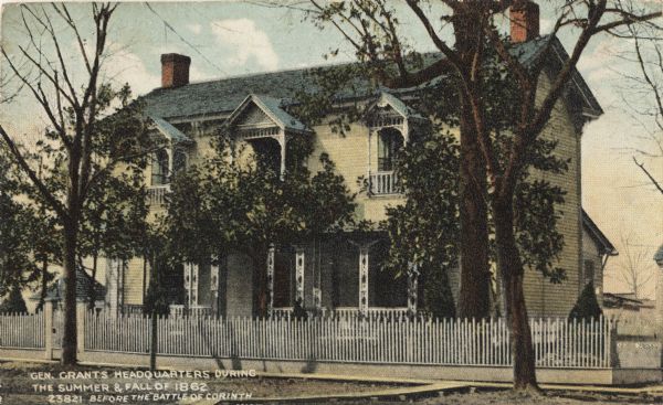View across street toward the headquarters. Caption reads: "General Grant's headquarters during the summer & fall of 1862 before the Battle of Corinth."