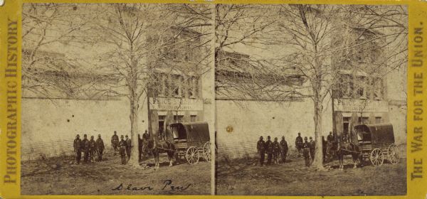 Stereograph of Union infantry standing in front of a slave dealer's shop.