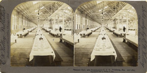 Stereograph view of the banquet hall for the 28th National Encampment of the Grand Army of the Republic. A man stands on the far right.