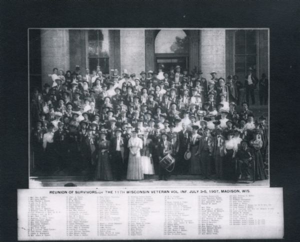 Group portrait of the reunion of survivors of the 11th Wisconsin Veteran Volunteer Infantry and their families.