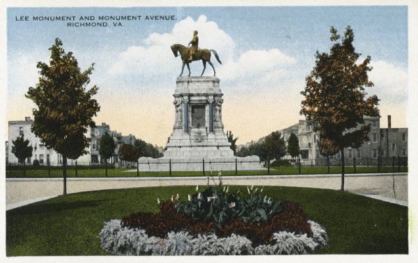 Color postcard featuring an equestrian statue of Confederate General Robert E. Lee. Caption reads: "Lee Monument and Monument Avenue. Richmond, VA."