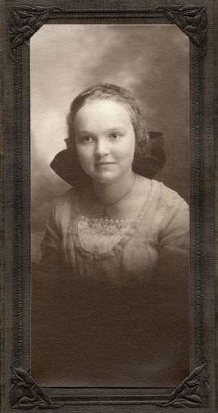 Studio portrait of Richard Quinney's mother, Alice Marie Holloway, as a girl.