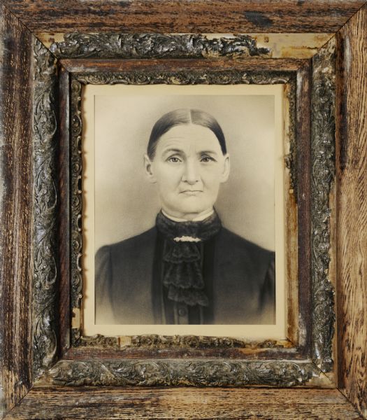 Wooden-framed studio portrait of Mary Potter Reynolds, Richard Quinney's great great grandmother.