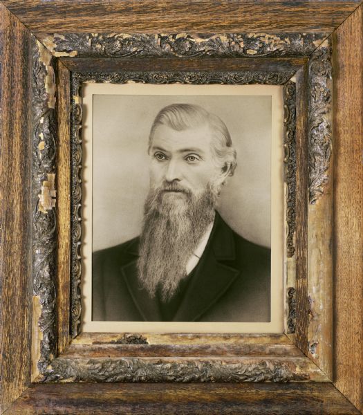 Wooden-framed studio portrait of Nathan Church Reynolds, Richard Quinney's great grandfather.