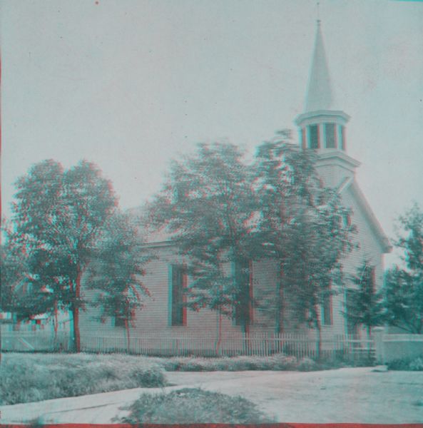 Anaglyph view of the exterior of Assembly Presbyterian Church, surrounded by trees.