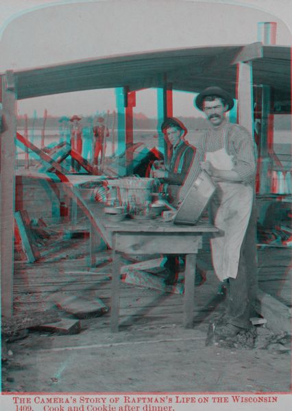 Stereograph of Ashley Bennett ("Cookie") who volunteered his services during the float, and the cook Mike Lane, on the Arpin fleet of lumber rafts.