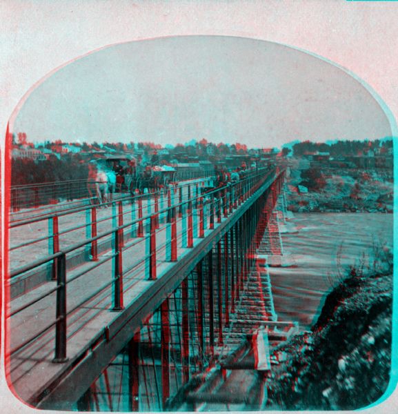 "Iron Bridge across Mississippi" photographed during "The Norwegian Lutheran Synod held at Minneapolis, Minn., 1875," as described in Dahl's 1877 "Catalogue of Stereoscopic Views."