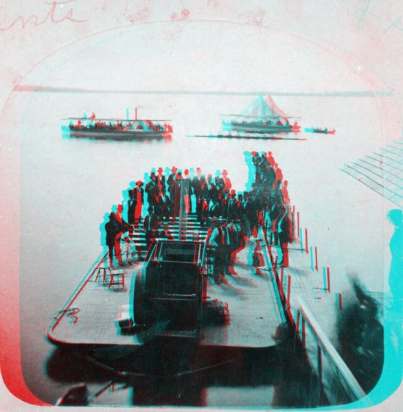 Stereograph of a lake scene in Madison, probably looking south on Lake Monona at a boat race in progress. From the series "The Beauties of the City of Madison and Vicinity."