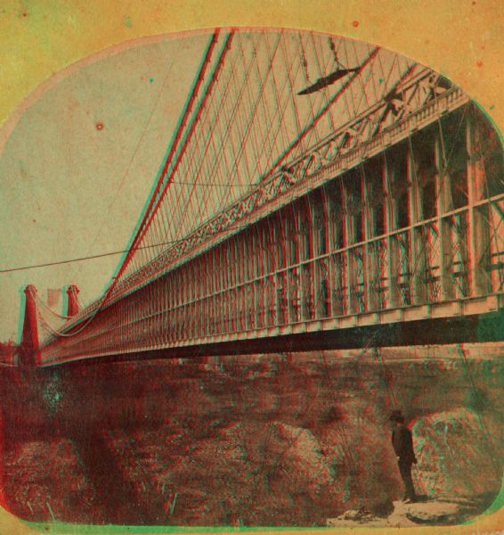 An A.L. Dahl photograph, one of "Two different side views of the Suspension Bridge," from the series "Niagara Falls and Suspension Bridge" as mentioned in his 1877 "Catalogue of Stereoscopic Views."