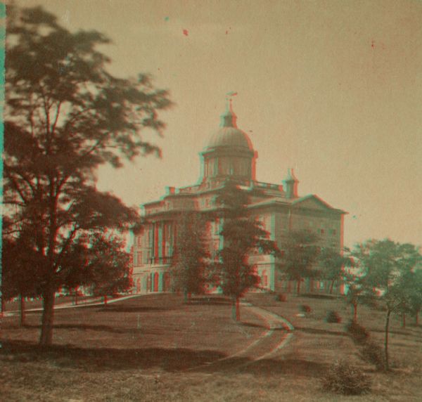 Stereograph of exterior of Main Hall (now Bascom Hall) on the University of Wisconsin-Madison campus.