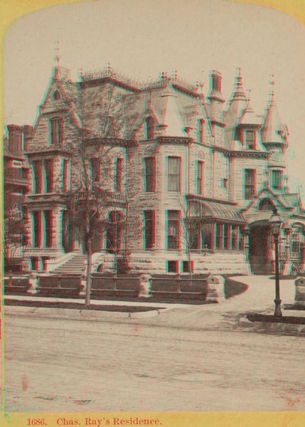 Stereograph of Broadway in Milwaukee. The mansion has many peaks on the roof, and the drive to the entrance is on the right.