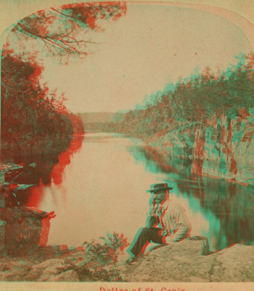 Stereograph of the Dalles and the Saint Croix River with man in the foreground.