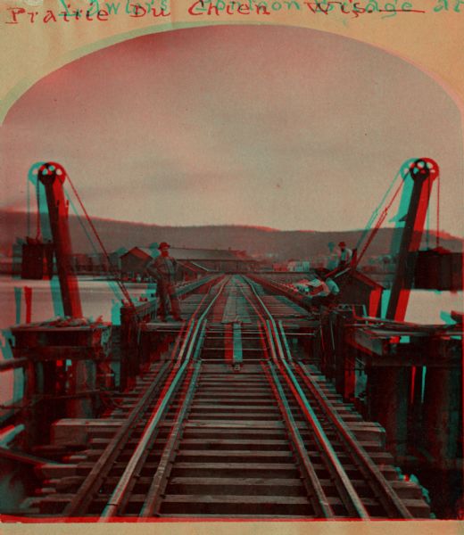 Stereograph of John Lawler's pile-pontoon railway bridge over the Mississippi River.