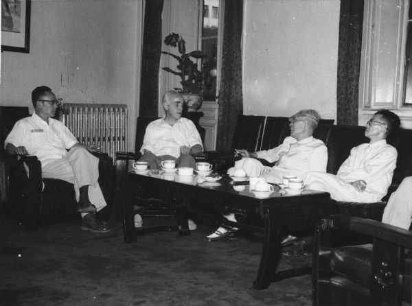 Cedric Belfrage of the "National Guardian" visiting with China philosophers in Peking. Belfrage was the first western correspondent to visit mainland China since the revolution.