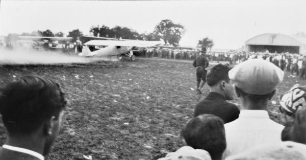 The landing of the "Spirit of St. Louis," carrying Charles Lindbergh.