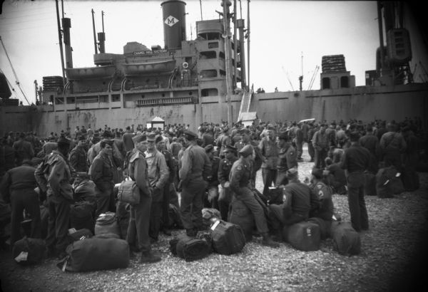 Soldiers waiting to board ship for their return home after World War II.