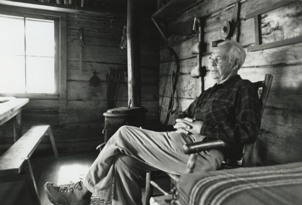 Iconic portrait of conservationist Sigurd Olson at his cabin at Listening Point. The Northland College environmental studies center is named in Olson's honor.