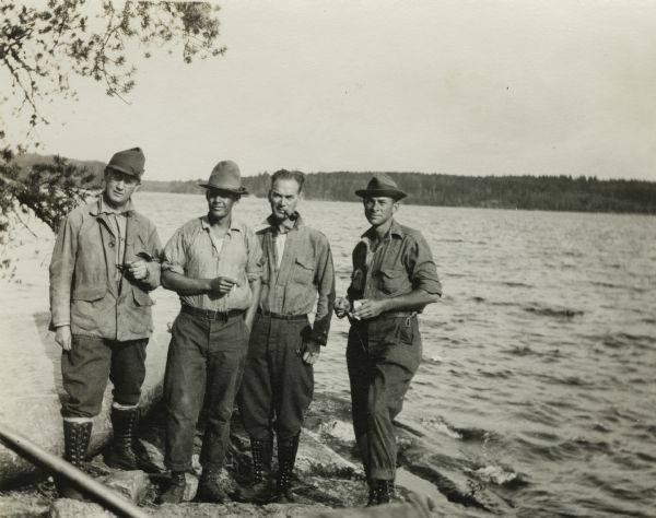 Sigurd Olson, second from the left, with one of the early groups that he guided into the wilderness near Ely, Minnesota. The other men are identified as Dr. James Burrill, Dr Sidney J. Knowles, and Ray Allen.