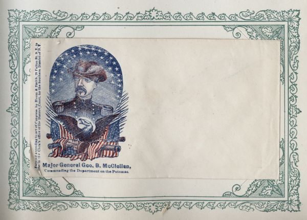 A "crest" of Major General George McClellan, on a background of a blue oval with white stars. An eagle with flags, bayonets, cannons, cannonballs and a drum is below. Caption below reads: "Major General Geo. B. McClellan, Commanding the Department on the Potomac." Red and blue ink on beige envelope, illustration on left side, printed on envelope, mounted on a decorative border and collected in an album.