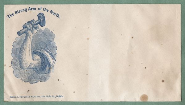 A strong muscular arm holds a sledge hammer. The caption above reads, "The Strong Arm of the North." Blue ink on beige envelope, image on left side. Image printed on envelope, mounted on various colored pages and collected in an album.