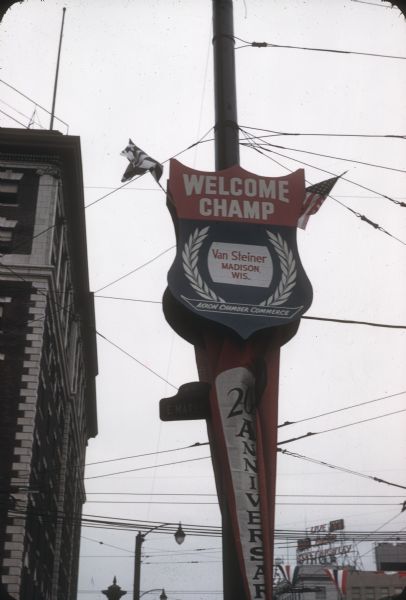 "Welcome Champ" sign for Van Steiner of Argyle, Wisconsin on the main street of Akron. In 1957 Van competed in the All-American Soap Box Derby at Derby Downs in Akron.