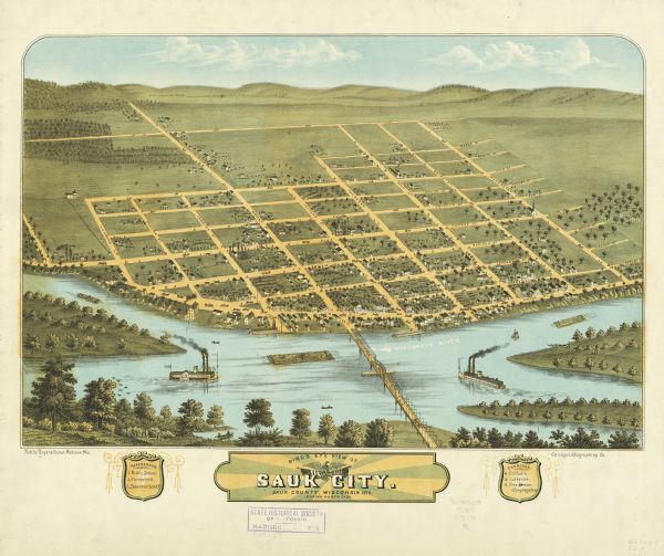 Sauk City is the oldest incorporated village in Wisconsin (incorporated in 1854) and also has the oldest organized volunteer fire department in the state, which was installed that same year. This 1870s birds eye view of Sauk City depicts street names and street layouts, houses, trees, a river and a bridge. A reference key at the bottom of the map shows the location of the city's public school, Turner Hall, Steamboat Land, and churches (Catholic, Lutheran and Free German Congregational). The view of the map is northeast.