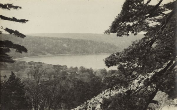 Elevated view of Devil's Lake from the top of the bluffs, talus slope visible on right.