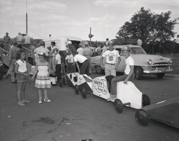 Fritz Ragatz waiting in line to race his WMTV-sponsored car on Midvale Avenue at the Madison soap box derby.