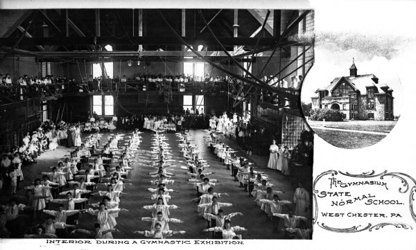 Composite image including children performing exercises inside a gymnasium and an inset drawing of the exterior of the State Normal School.  Text at bottom right reads, "The Gymnasium - State Normal School, West Chester, PA."  Text beneath the photograph reads, "Interior, During a Gymnastic Exhibition."