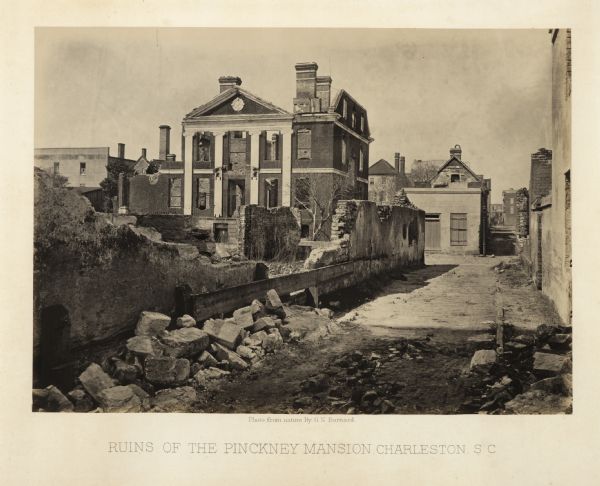 Ruins of the Pinckney Mansion with rubble in the street after General Sherman's men burned the town near the end of the Civil War.<br>Plate 59</br>