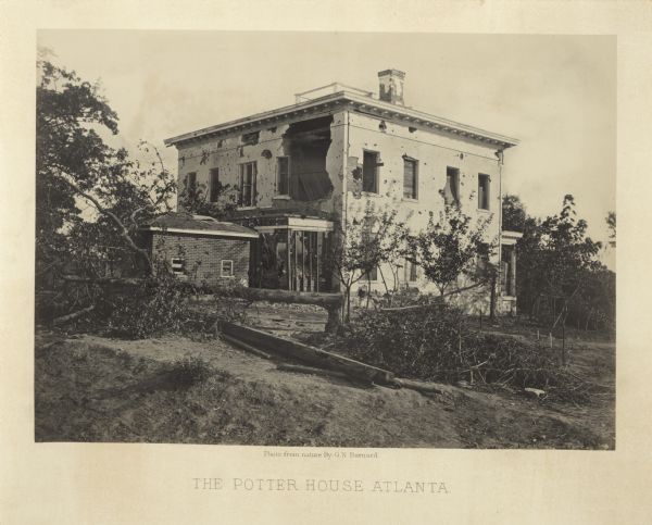 View of heavily damaged house and felled trees after General Sherman's army passed through.<br>Plate 38</br>
