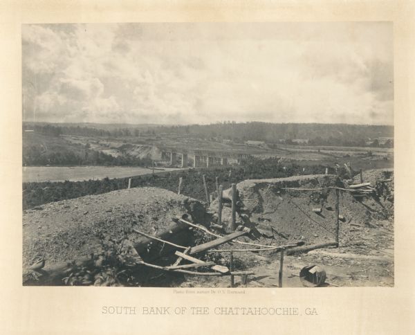 The south bank of the Chattahoochie River with a bridge spanning it. In the foreground are some battlements.<br>Plate 33</br>