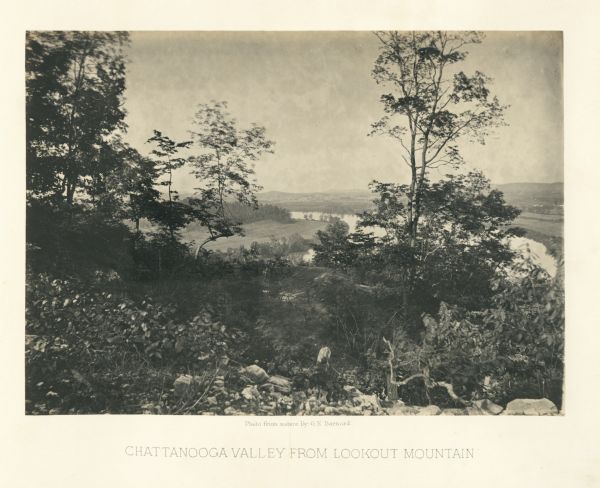 View of the Chattanooga Valley and a river from Lookout Mountain. Trees are in the foreground, and a city is in the background across the river.<br>Plate 13</br>