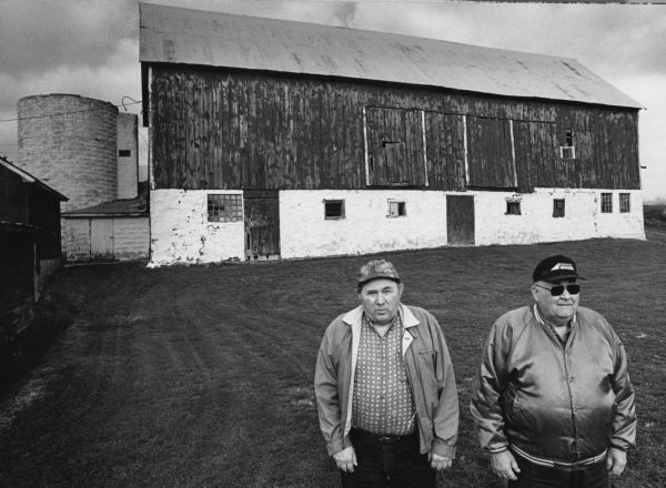 Brothers Roy (left) and Earl (right) Lichtenberg, are the 4th generation of Lichtenbergs to live on this farm. The farm, at W1918 McArthur Road (Section 17), was settled in 1864 by their great-grandfather, Friedrick. The farm was passed on to Ferdinand in 1890 and then to Edgar in 1937. Earl, Roy & Roger, obtained the property from their father, Edgar, in 1973.

