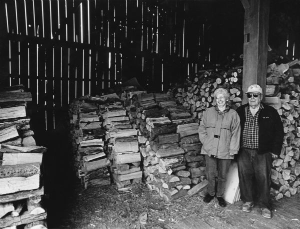Ken and LaVerne Schoebel have firewood stored in their barn. They will celebrate their 50th wedding anniversary on May 16, 2004.