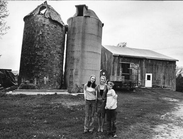 Cherie Krenz Schellinger and her children, Dawn and David, live at 7464 Freedom Road (Section 35). Note the very old wooden silo.


