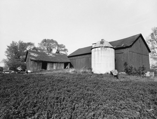 These barn buildings are owned by Ken Schoebel, who lives up the West Bend Road.
