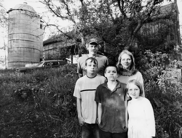 The Adams family lives at W584 Hwy 28. Their home overlooks the Theresa Marsh. Jeff and Maureen are pictured with their children, (l to r) Joshua, Michael, and Megan.