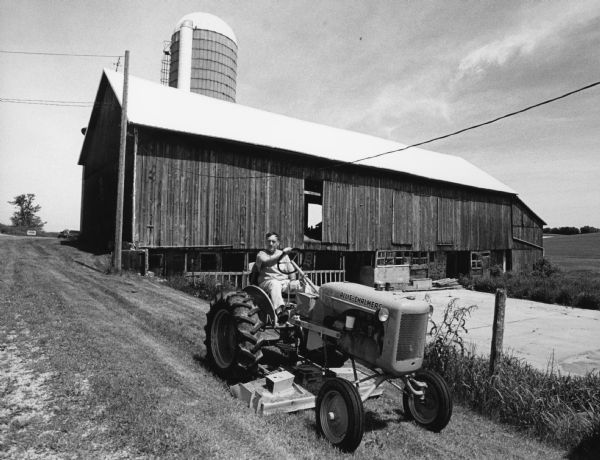 Roger Sarasin, who live at N7785 Hwy 175 (Section 25), moved this antique 1939 Allis-Chalmers B tractor into the composition.