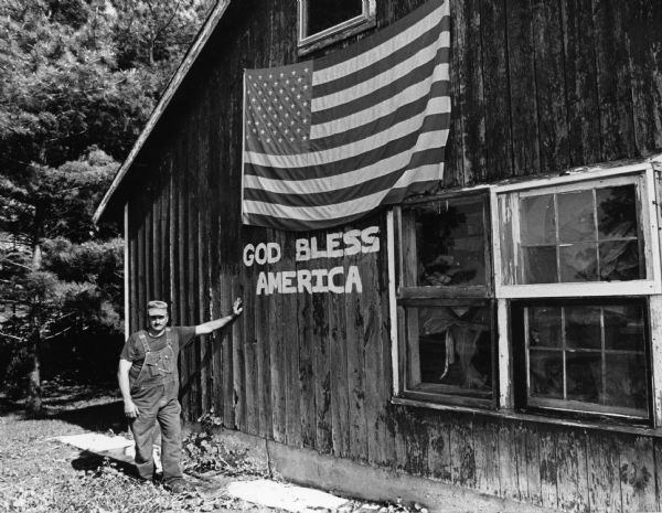Marvin Giese shows his feelings to his country with this display on a barn wall.